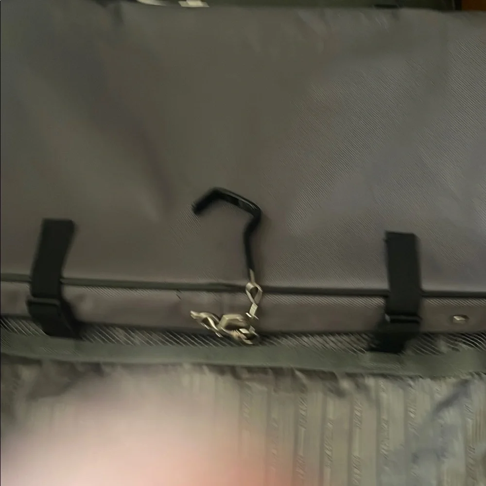 Black and Gray Travel Bags with Metal Accents